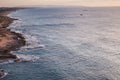 Seascape Sunset Photography print with a fisherman on rocks and boat at the sunset — Rosh Hanikra, Israel — Canvas