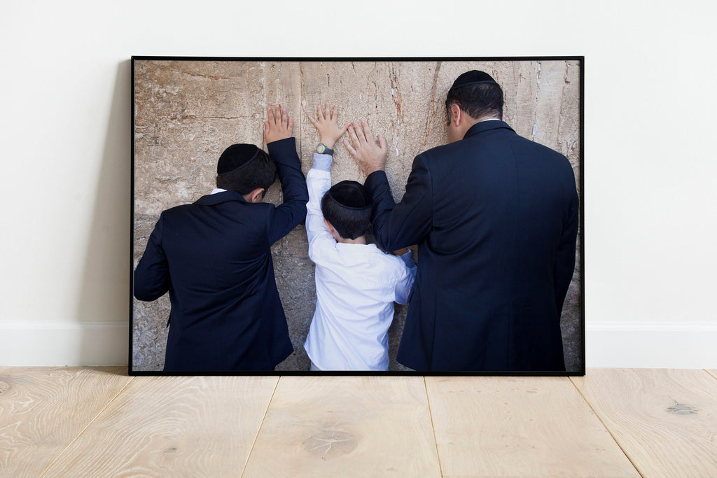 Jewish Wall Kotel — Father and sons praying on a stone of the wailing wall, the Kotel, Jerusalem