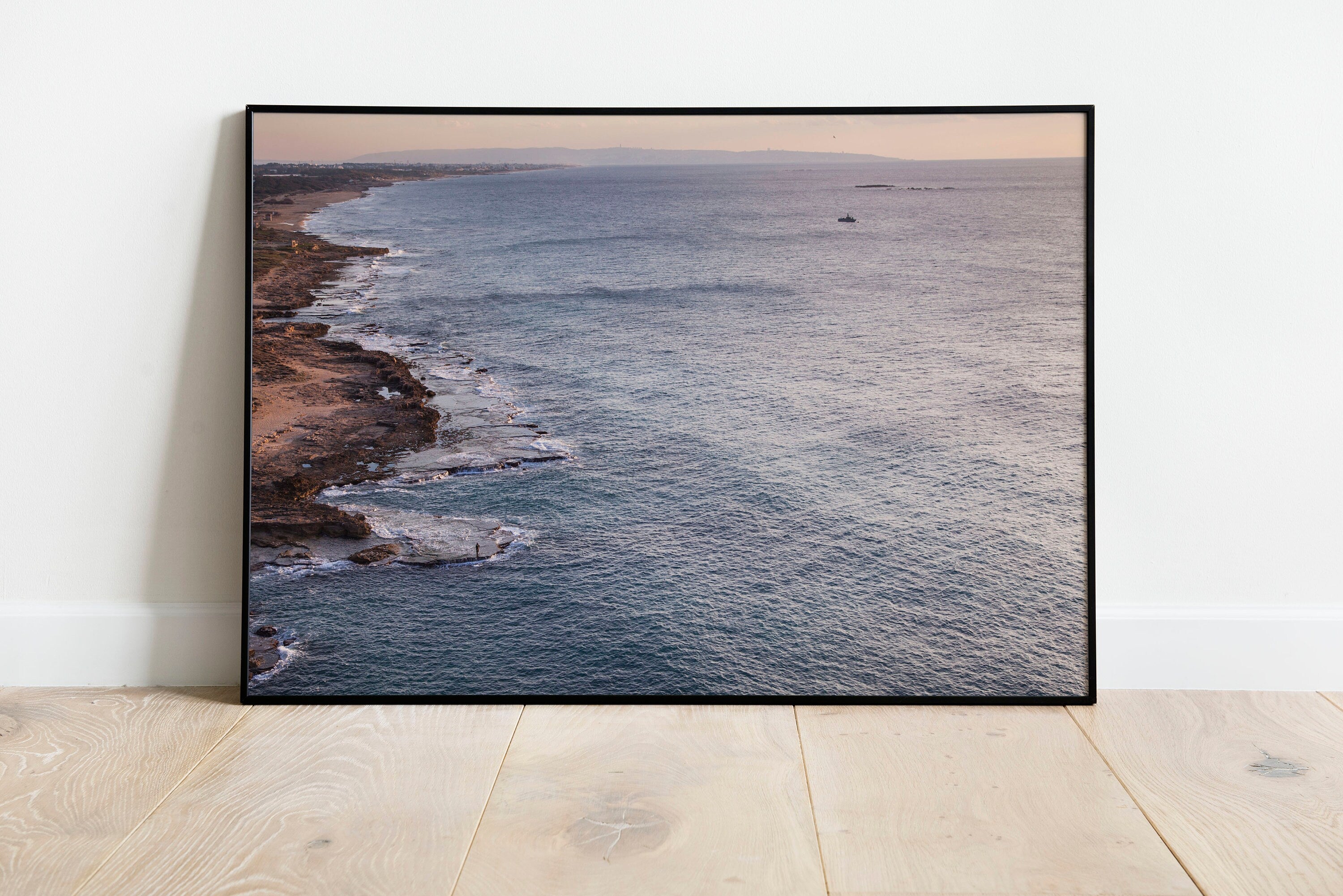 Seascape Sunset Photography print with a fisherman on rocks and boat at the sunset — Rosh Hanikra, Israel — Canvas