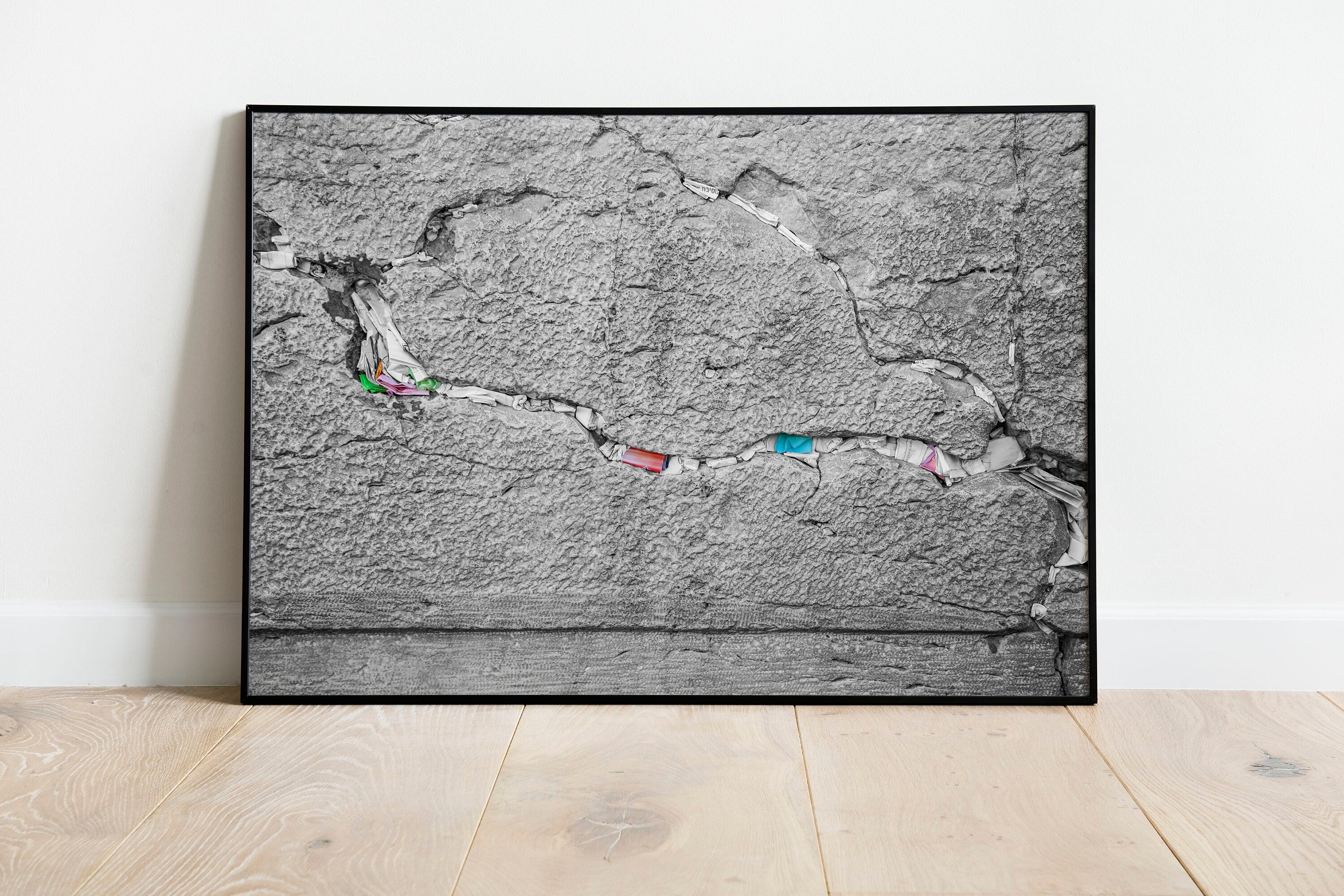 Black and White Jewish Kotel Stone with Colored Prayer Paper Notes between Stones