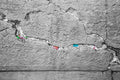 Black and White Jewish Kotel Stone with Colored Prayer Paper Notes between Stones