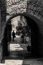 Black and White Jerusalem Old City Pedestrian Street with Jewish Orthodox walking to the Kotel