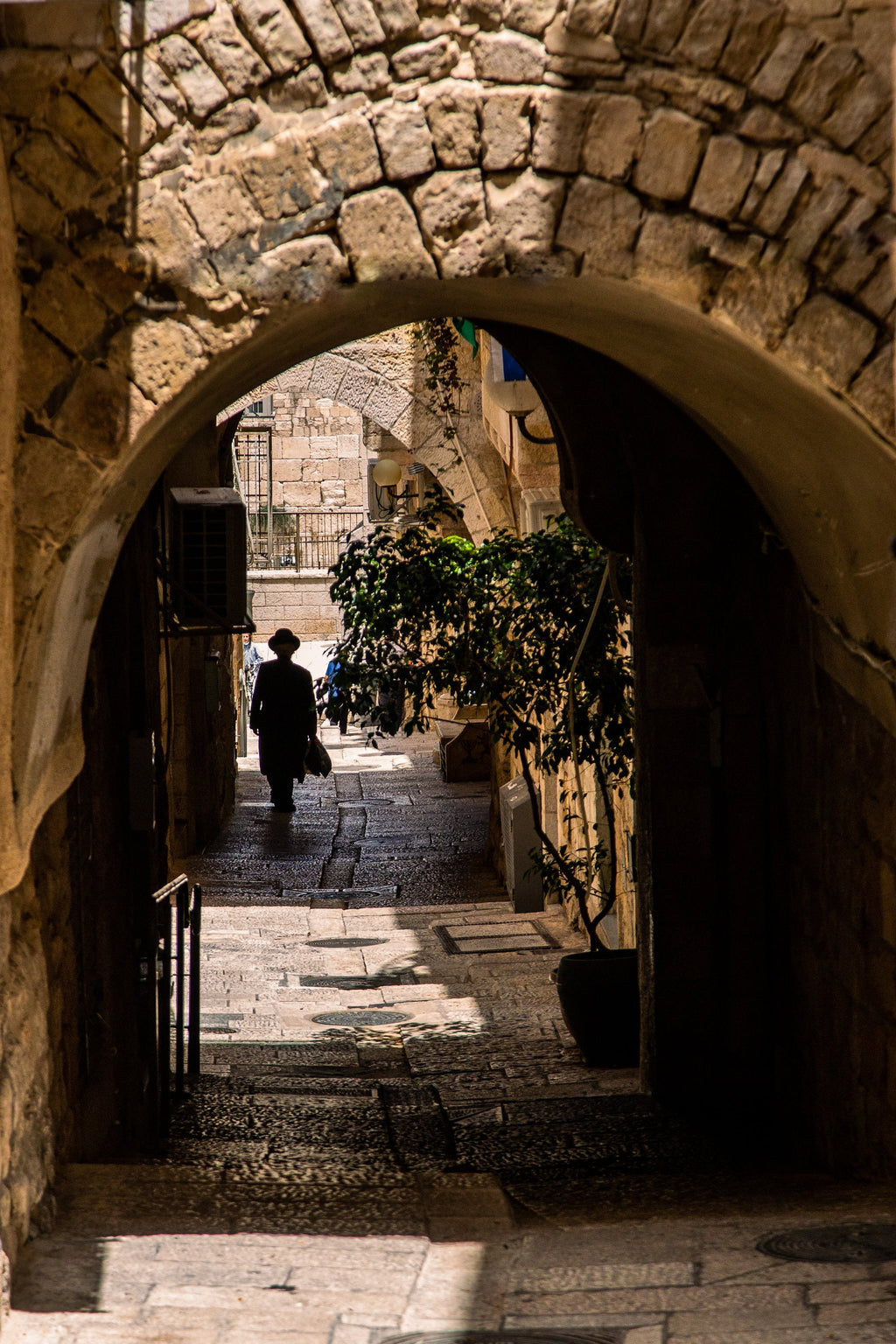 Jerusalem Old City Pedestrian Street with Jewish Orthodox walking to the Kotel Western Wall
