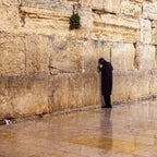 Jewish Orthodox Prayer Alone at the Kotel at Night and during the Rain — Western Wall Photography