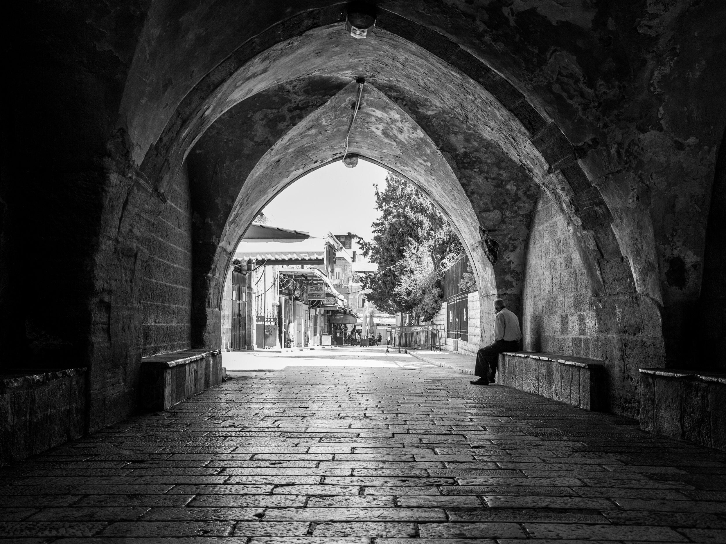Old Man in a Old City Pedestrian Street — Black and White Jerusalem Wall Wart