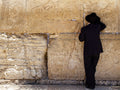 Jewish Orthodox Man Praying at the Jerusalem Old City Western Wall (Kotel)