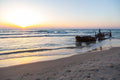 Israeli Seascape Print: Sunset Beach with Wrecked Boat