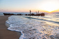 Holy Land Israeli Seascape with Wrecked Fishing Boat — Beach and Waves At Sunset