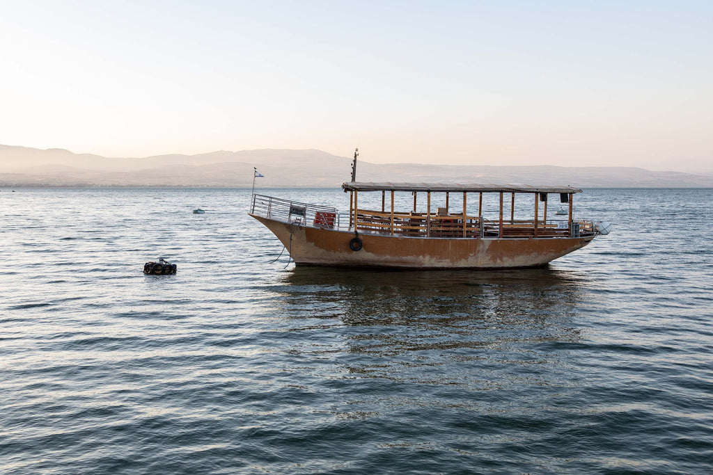 Israeli Holy Land Sea of Galilee — Kinneret Tiberias Lake with a boat