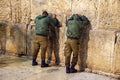 Two Jewish IDF Tsahal Soldiers Praying at the Kotel Western Wall