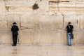 IDF Tsahal Soldier and Jewish Orthodox Praying Together at the Kotel Western Wall