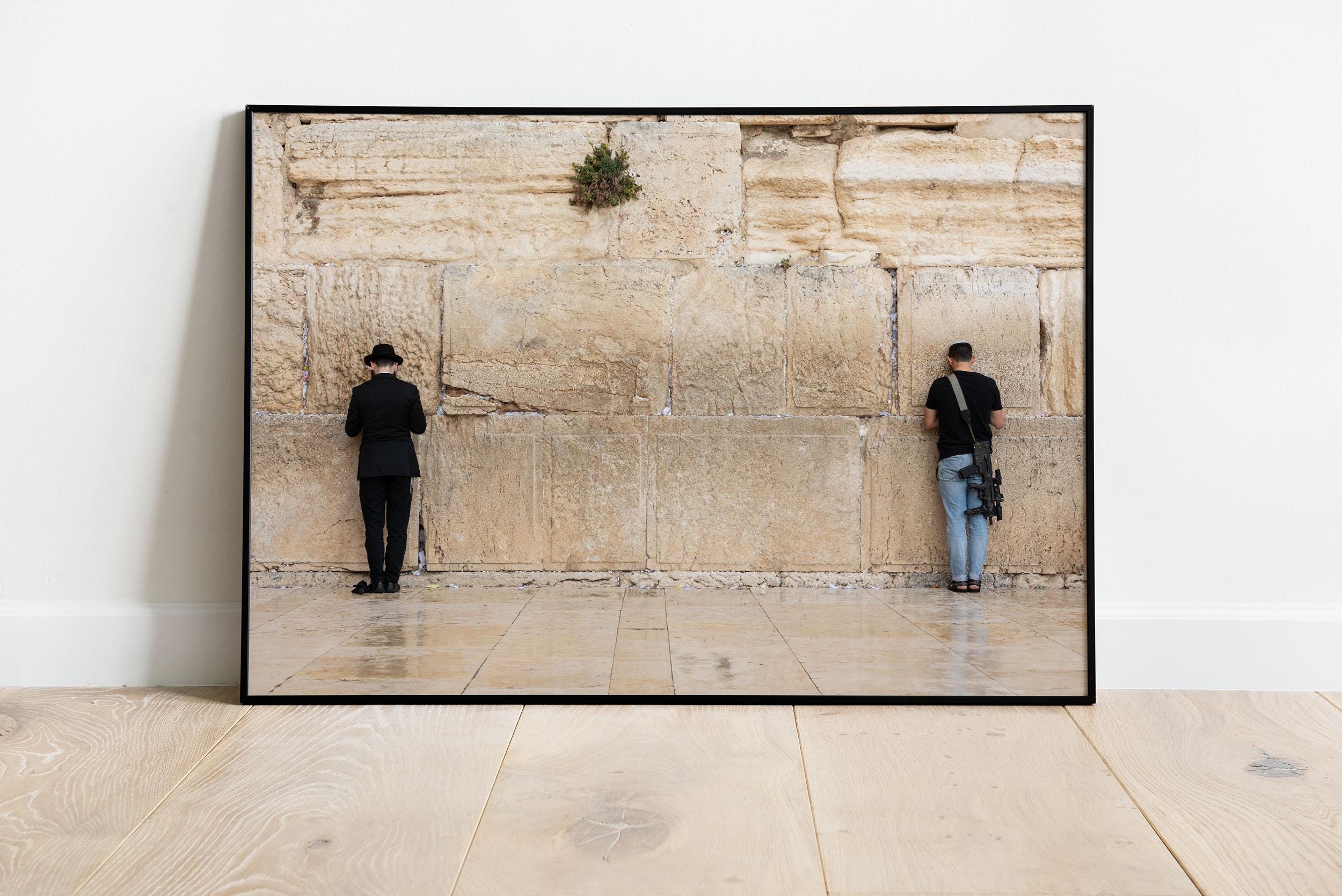 IDF Tsahal Soldier and Jewish Orthodox Praying Together at the Kotel Western Wall
