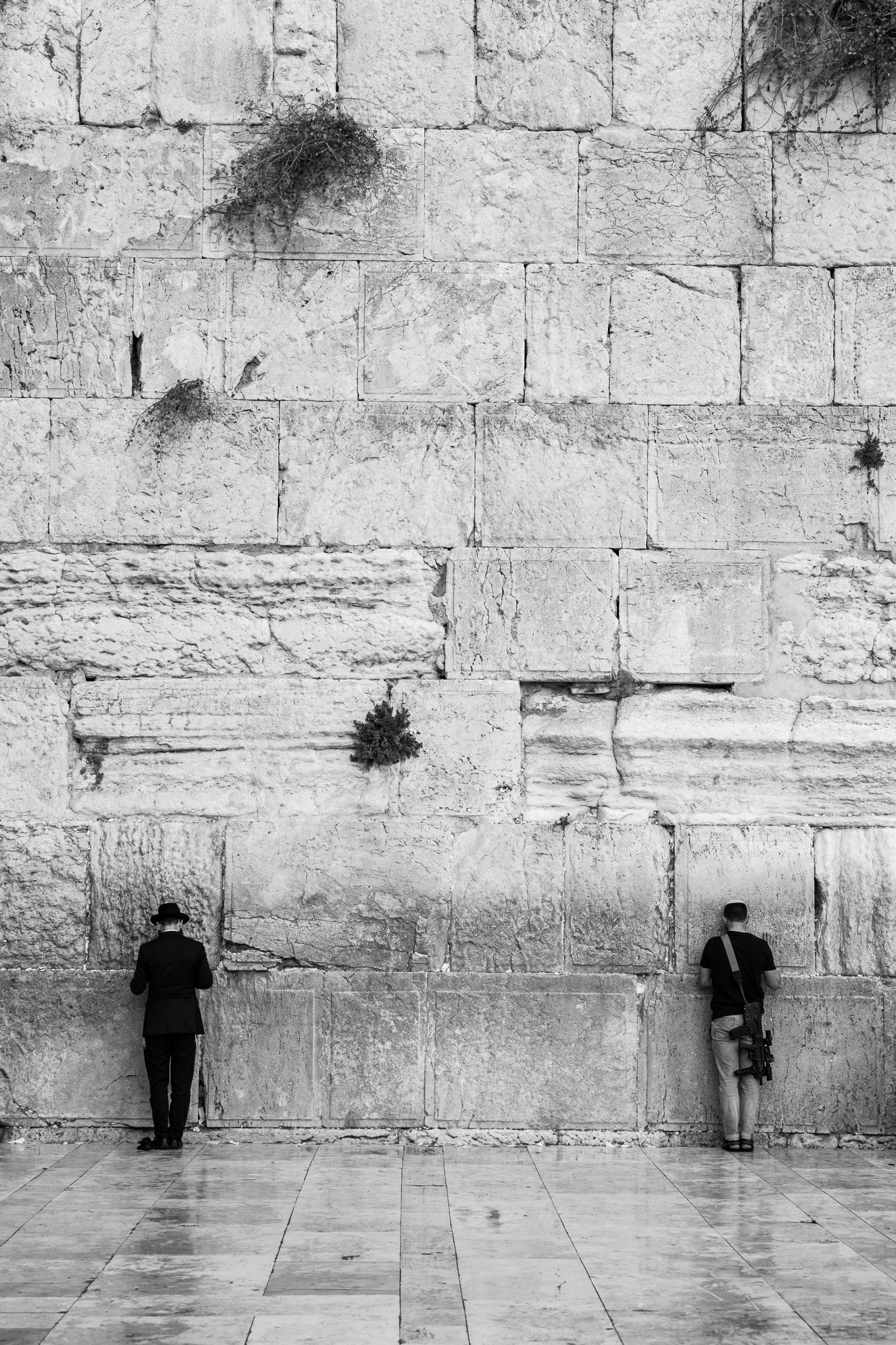 Black & White IDF Tsahal Soldier and Jewish Orthodox Praying Together at the Kotel Western Wall
