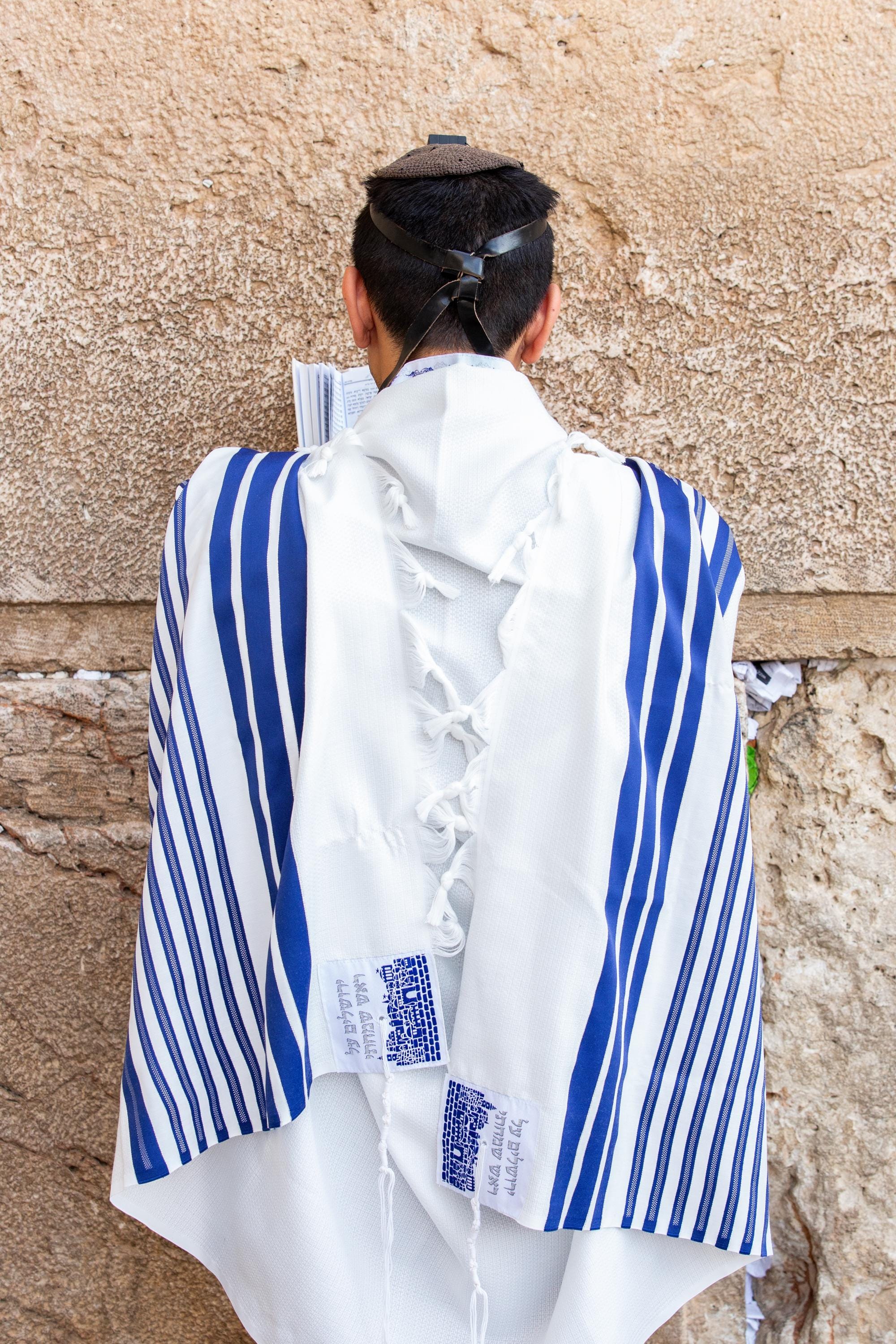 Kotel Western — Jewish Man Praying with Blue Tekhelet Tallit