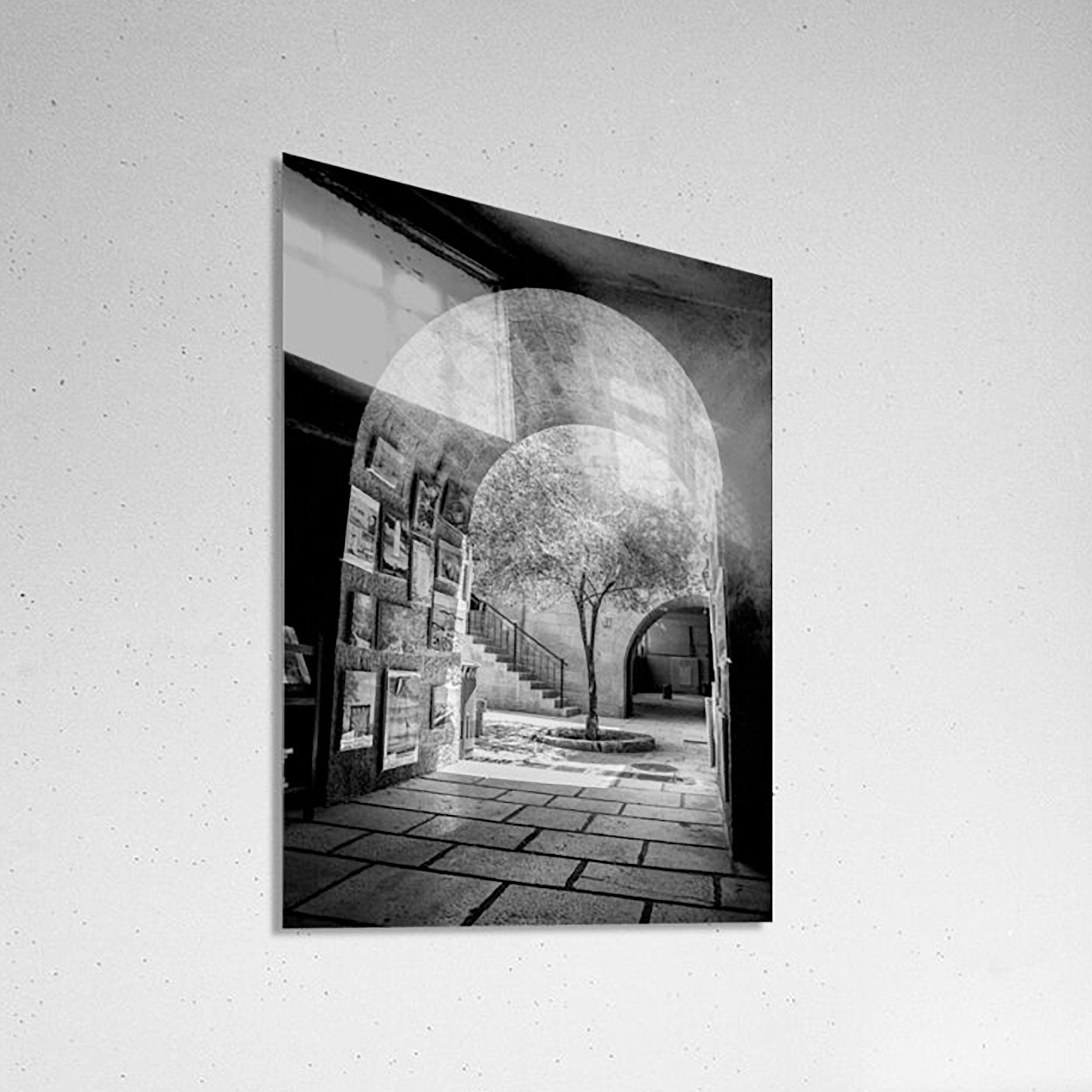 Black and White Jerusalem Old City Pedestrian Street with Olive Tree, Arch and Paintings on wall