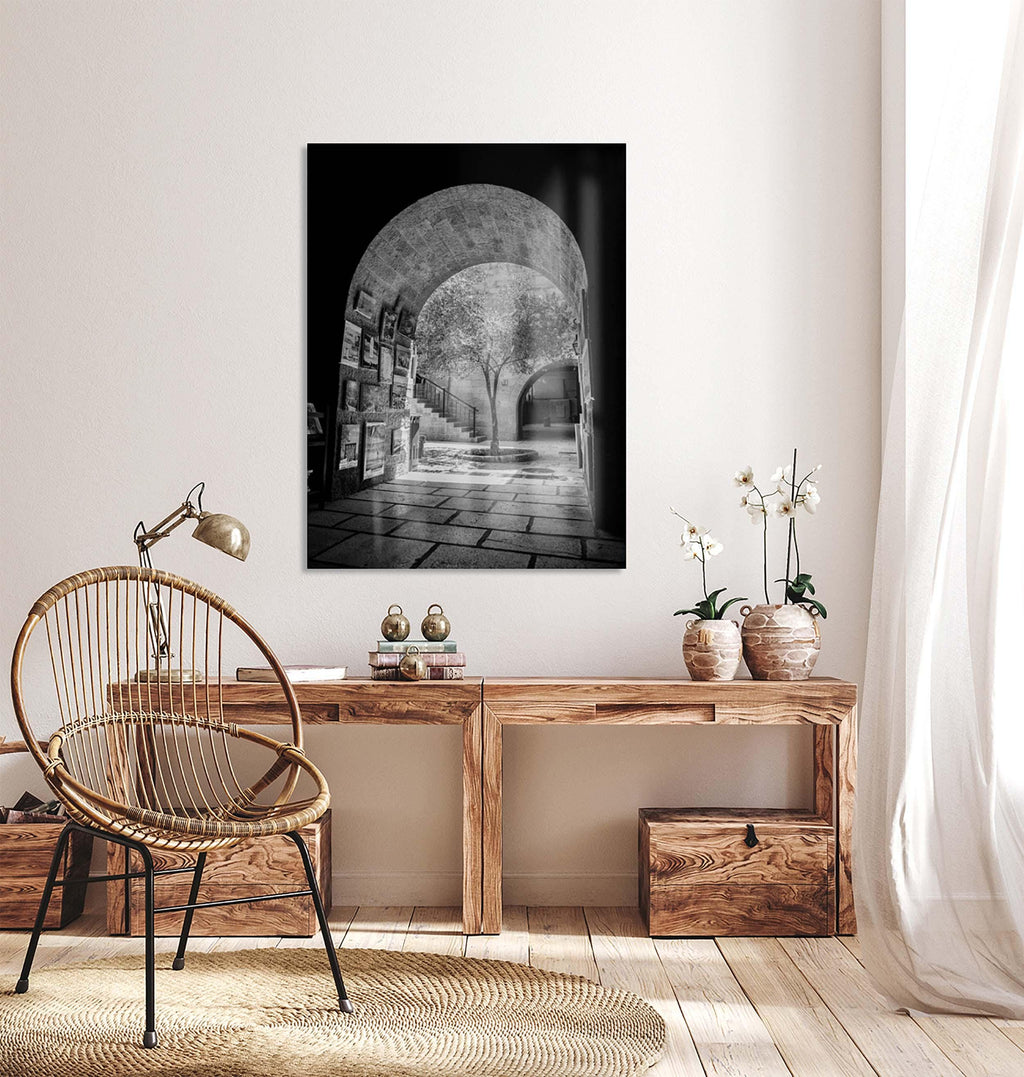 Black and White Jerusalem Old City Pedestrian Street with Olive Tree, Arch and Paintings on wall