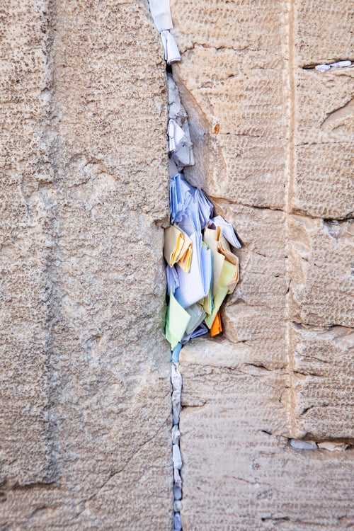 Gap Between Kotel Western Wall Stones with Colorful Prayer Paper Notes
